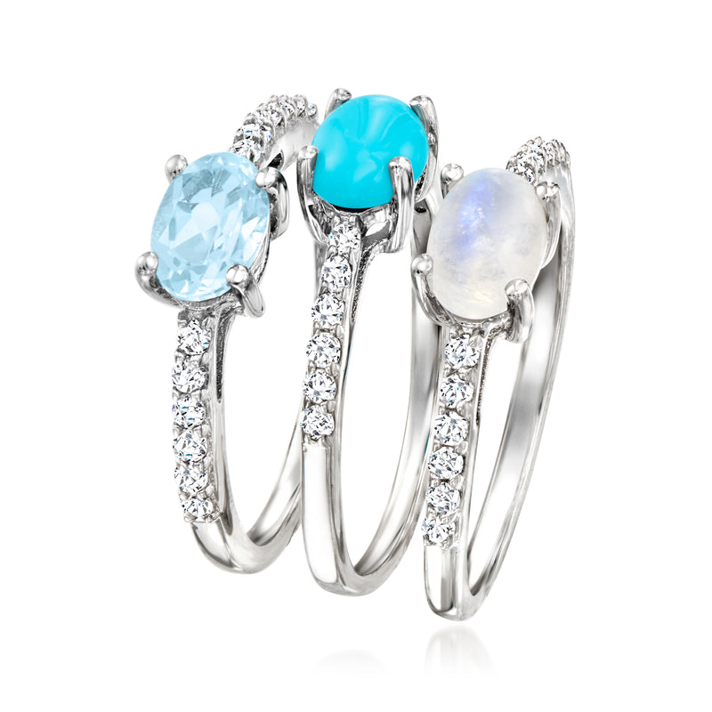 Sterling silver three-ring set with blue, turquoise, and white gemstones