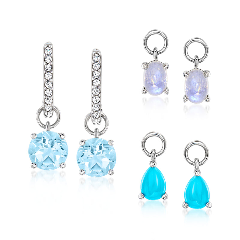 Sterling silver hoop earrings with round gemstone drops—light blue, opal purple, and teal