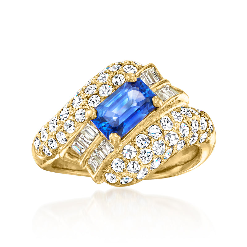 Vintage yellow gold ring with large blue sapphire and diamond halo and pave details