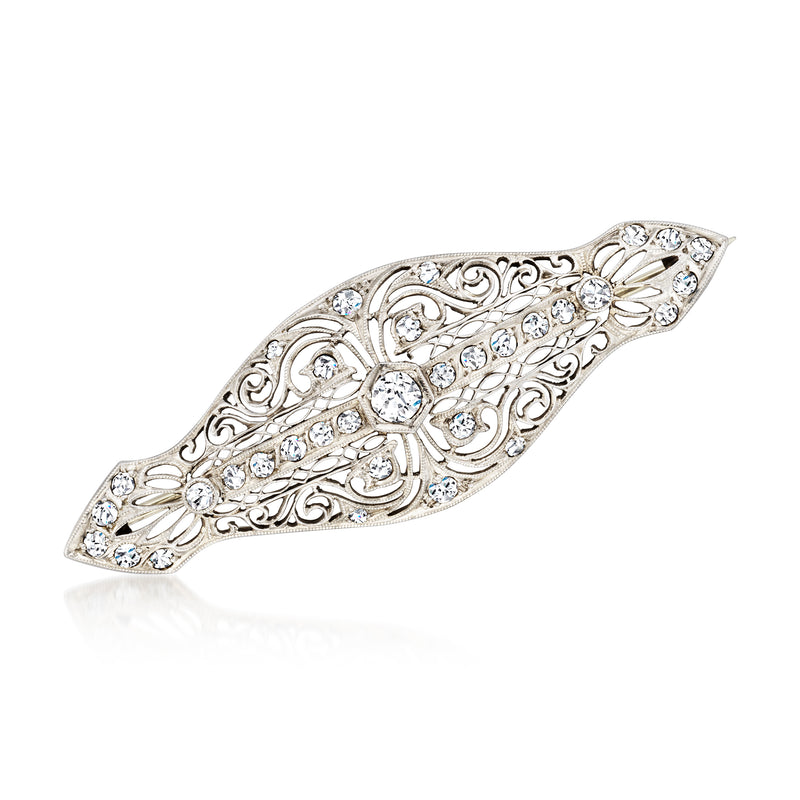 Platinum filigree diamond pin with marquise center and sparkling side stones