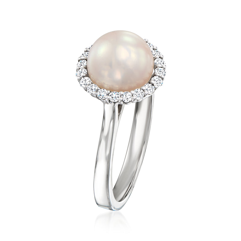 Cultured pearl and diamond halo ring in white gold with split band, round center pearl