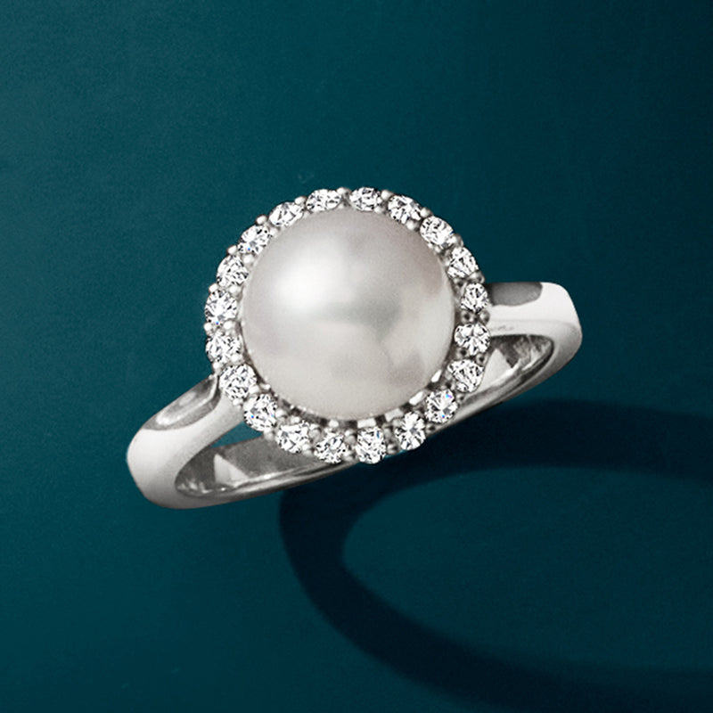 Cultured pearl and diamond halo ring in white gold, round pearl with jeweled halo