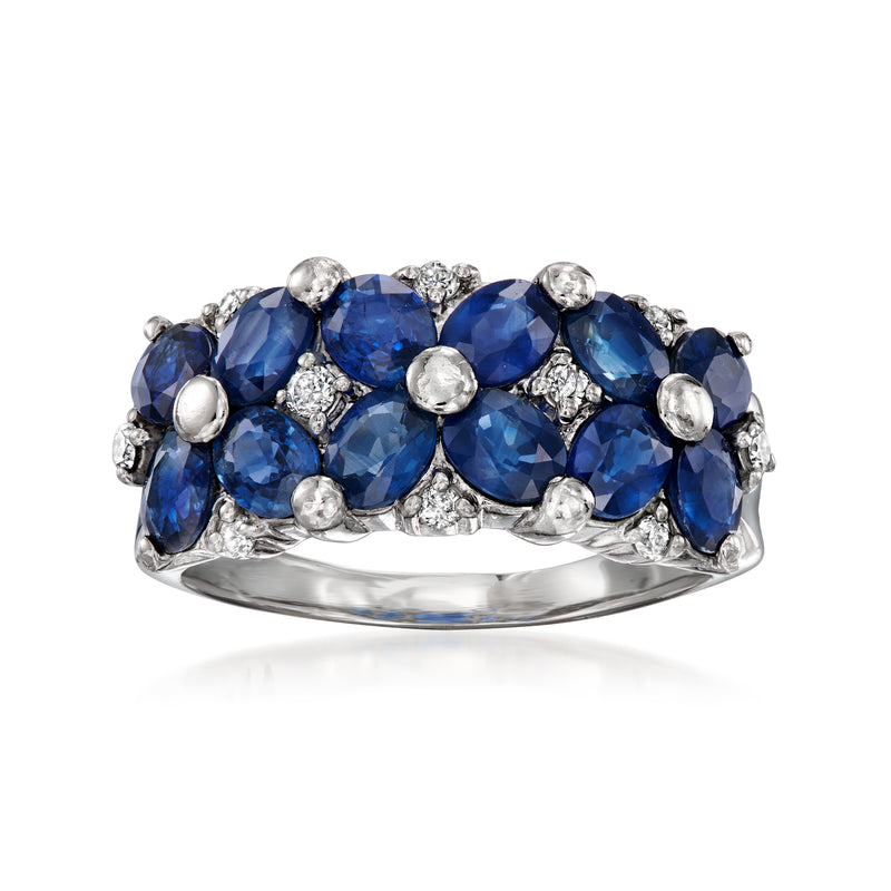 Platinum vintage ring with oval blue sapphires and round diamond accents