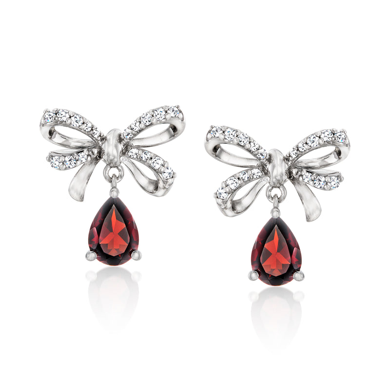 Sterling silver bow drop earrings with red teardrop gemstones and clear crystal accents