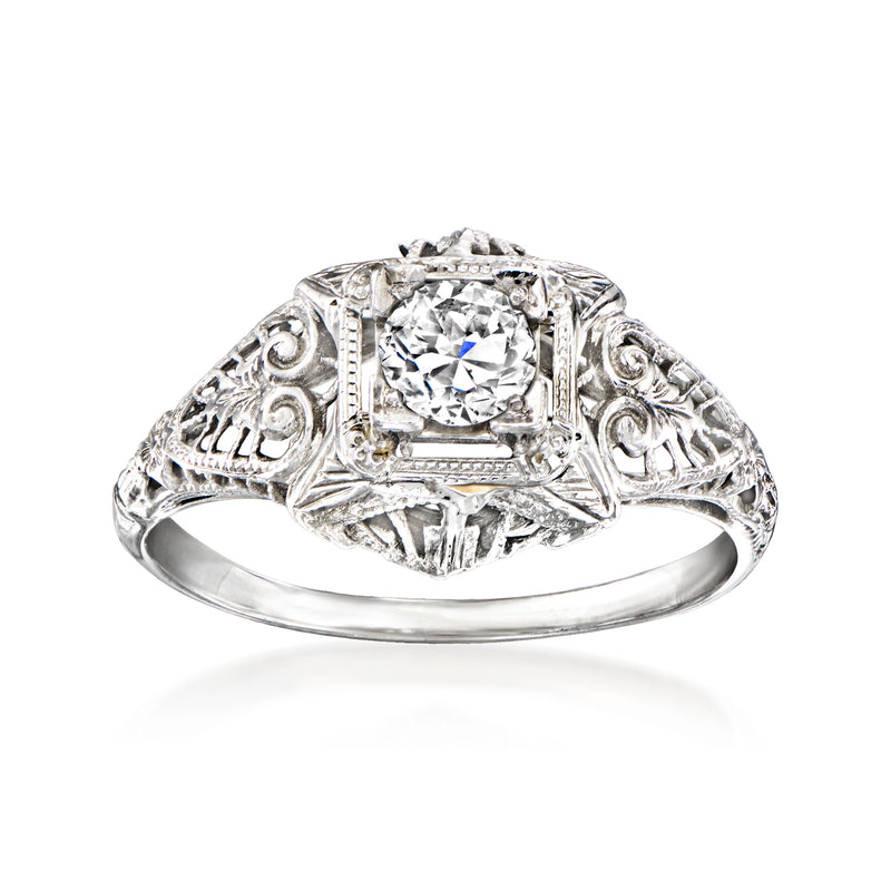 18kt white gold vintage diamond filigree ring with round center stone