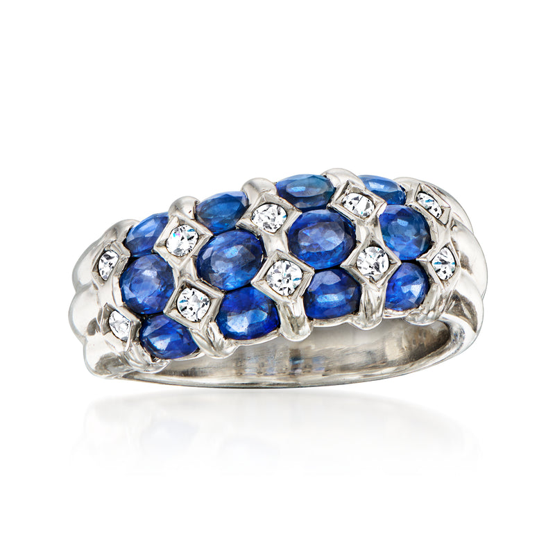 Platinum sapphire and diamond striped ring with blue stones and small round diamonds