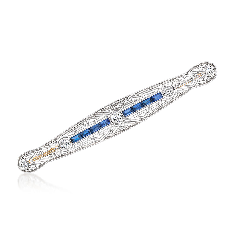 Platinum bar filigree pin with blue sapphire and clear diamond accents