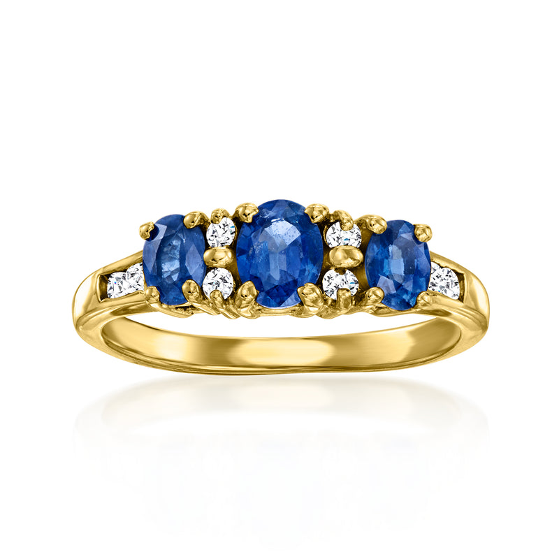 18kt yellow gold sapphire and diamond ring with three oval blue stones