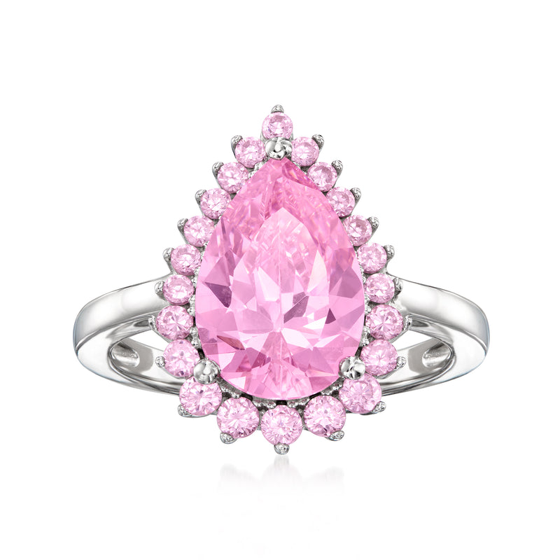 Sterling silver ring with oval pink simulated sapphire center and pink halo
