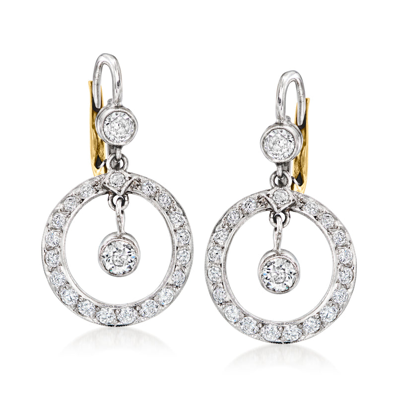Platinum diamond circle drop leverback earrings with pavé halos and center drops