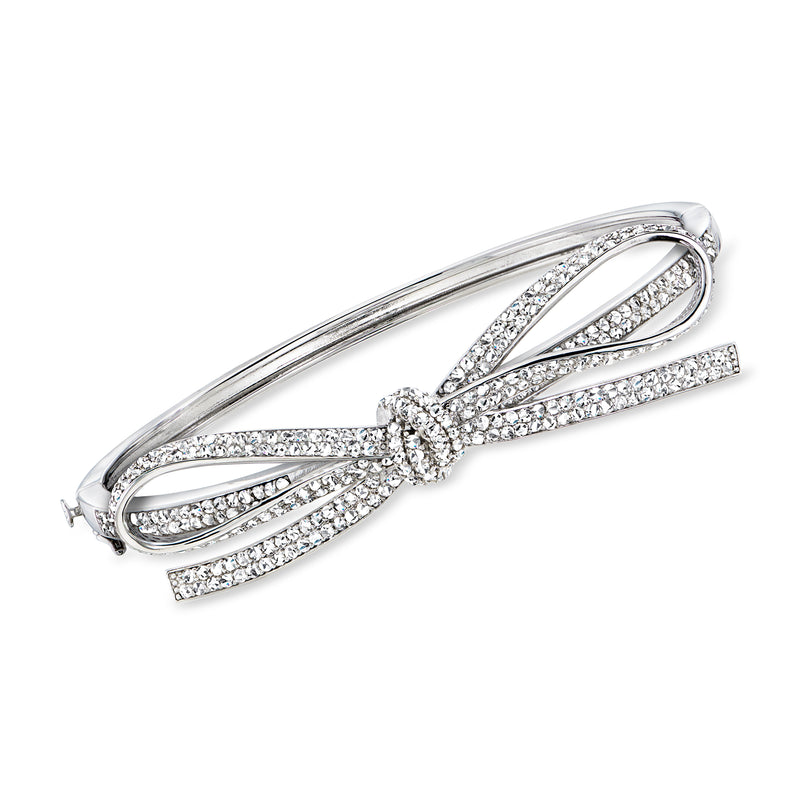 Sterling silver bow bangle bracelet with sparkling white gemstone pave accents