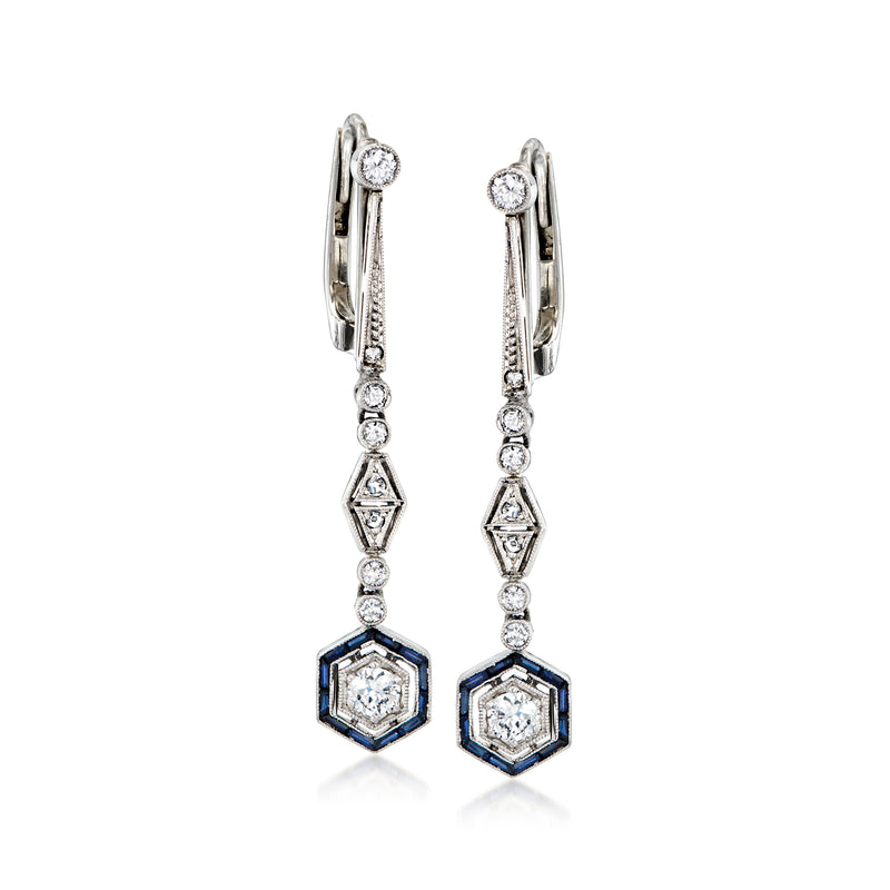 Platinum and white gold drop earrings with diamond accents and blue sapphire octagon drops