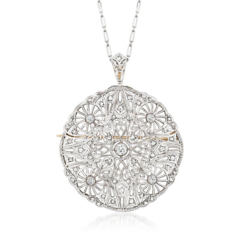 Round filigree diamond pendant necklace, platinum-toned setting with bezel-set stones
