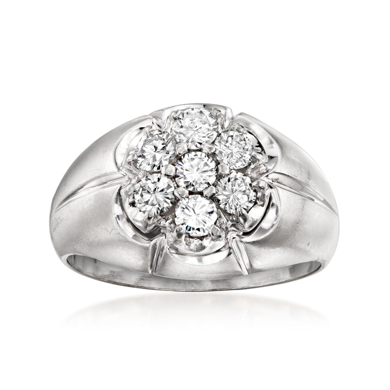 14kt white gold diamond cluster ring with round center stone and surrounding diamonds
