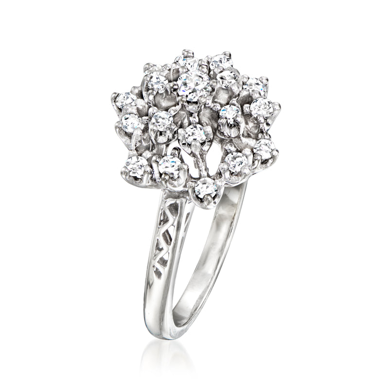White gold diamond cluster ring with round stones and patterned openwork band