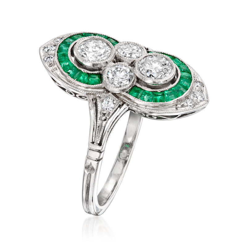 Platinum vintage diamond ring with emerald-green bezels and round stones, side view