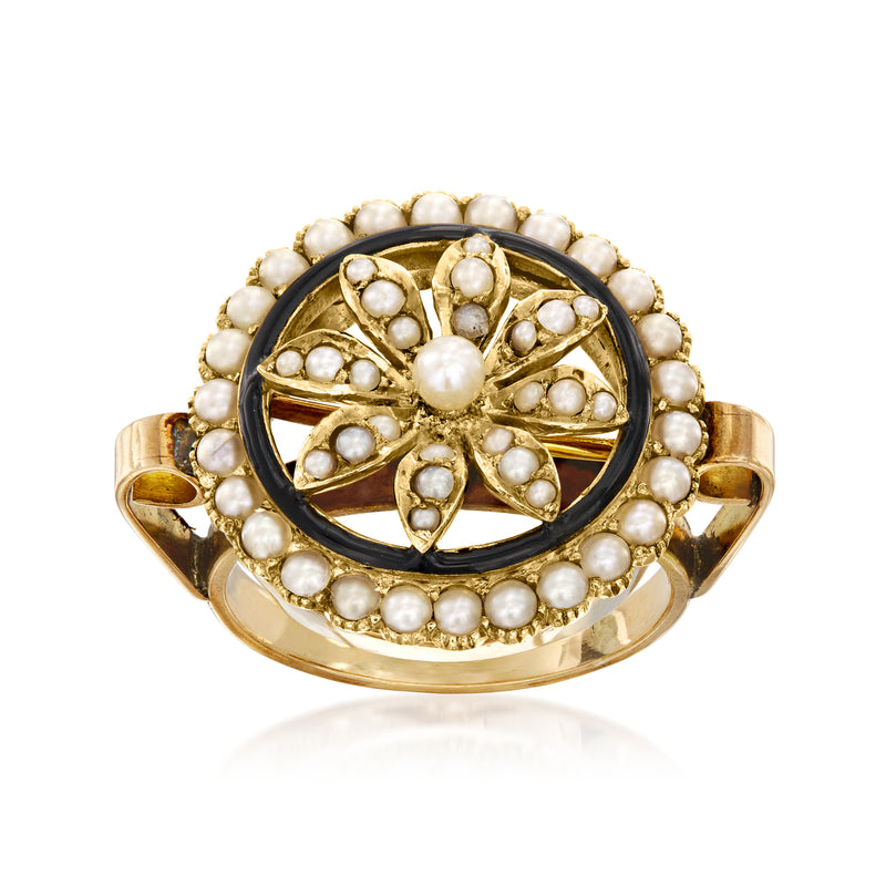 Gold ring with black enamel flower center and pearl halo
