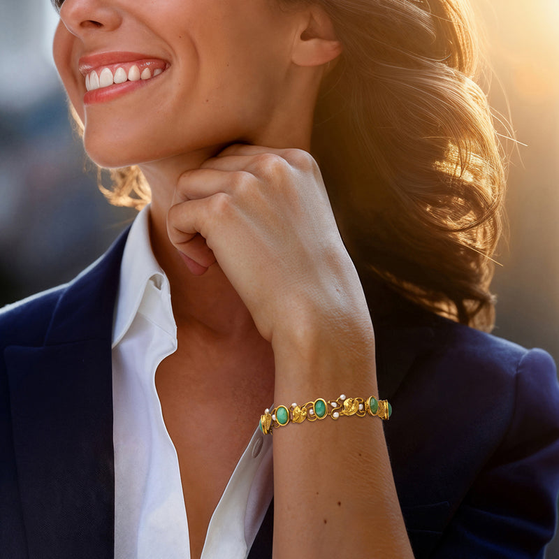 14kt yellow gold bracelet with green chrysoprase and cultured baroque pearls on wrist