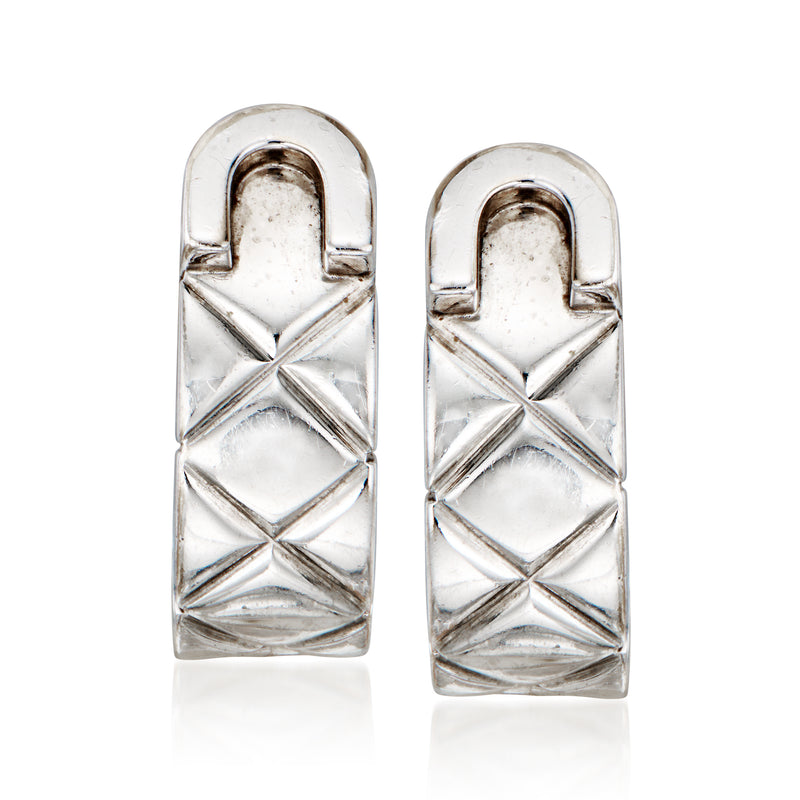 Vintage Chanel curved white gold earrings with geometric embossed pattern