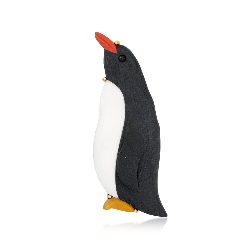 Vintage penguin pin with black body, white belly, red head, and gold accents