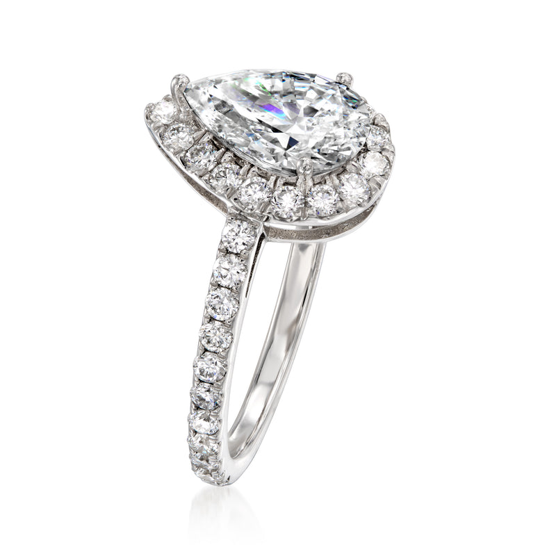 14kt white gold ring with pear-cut lab-grown diamond and pavé diamond band