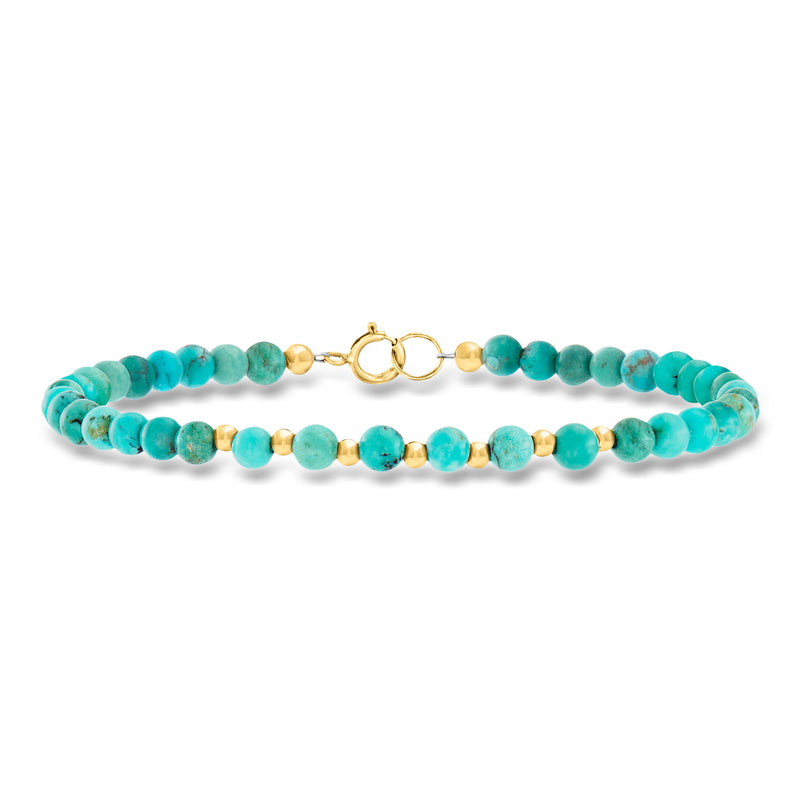 Turquoise howlite bead bracelet with 10kt yellow gold clasp and small gold spacers