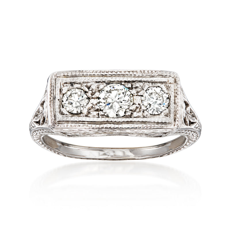 Vintage three-stone diamond filigree ring, rectangular setting, 14kt white gold
