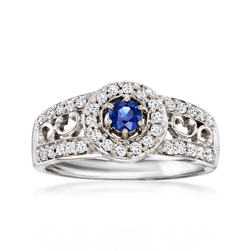 Vintage sapphire and diamond halo ring in 14kt white gold, blue center stone