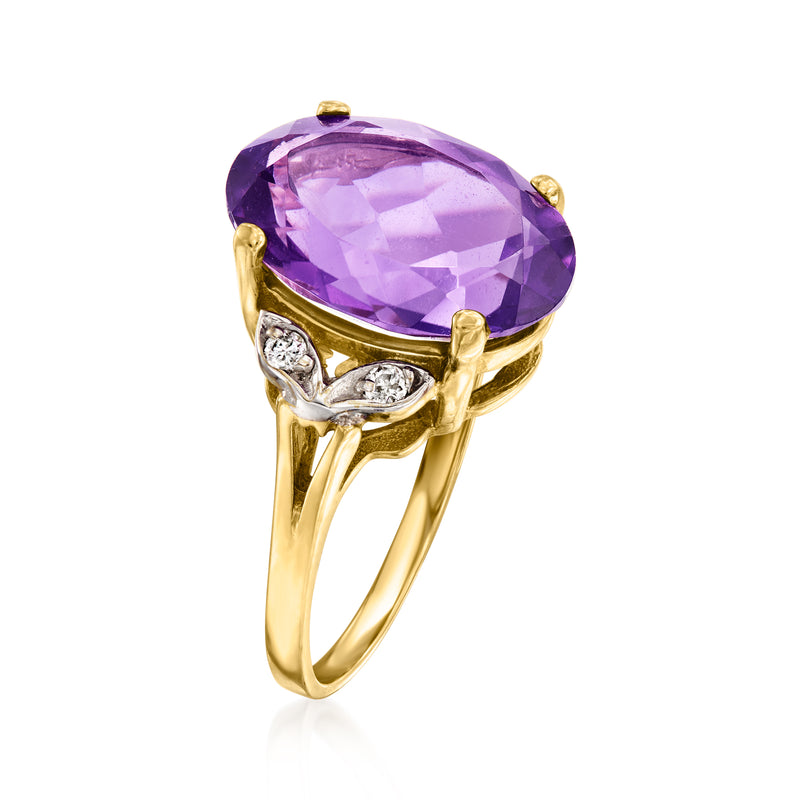 Oval purple amethyst ring in yellow gold prong setting with diamond side clusters