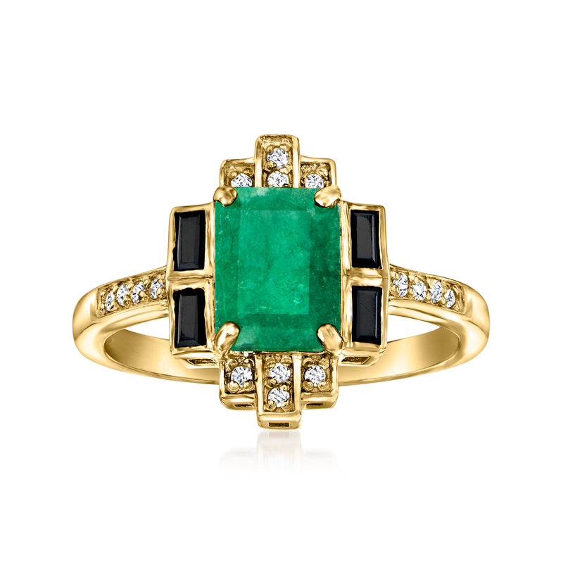 Gold-tone ring with emerald-green rectangular center stone, black square accents, white stones