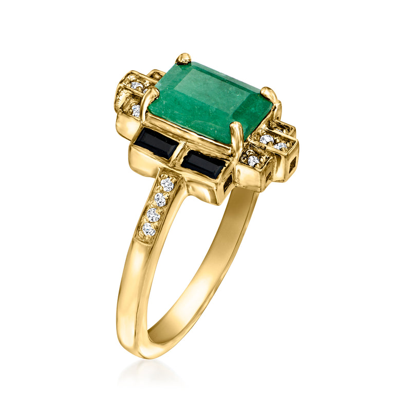 Gold-tone emerald-green stone ring with black square accents and white side stones