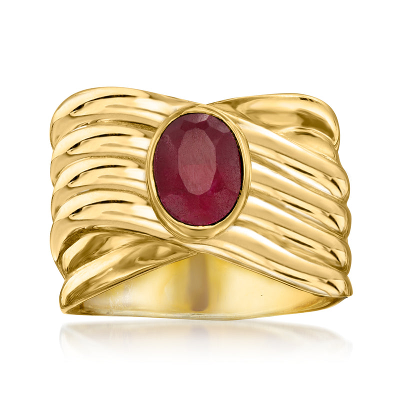 Gold crisscross ring with oval ruby cabochon center and ribbed band