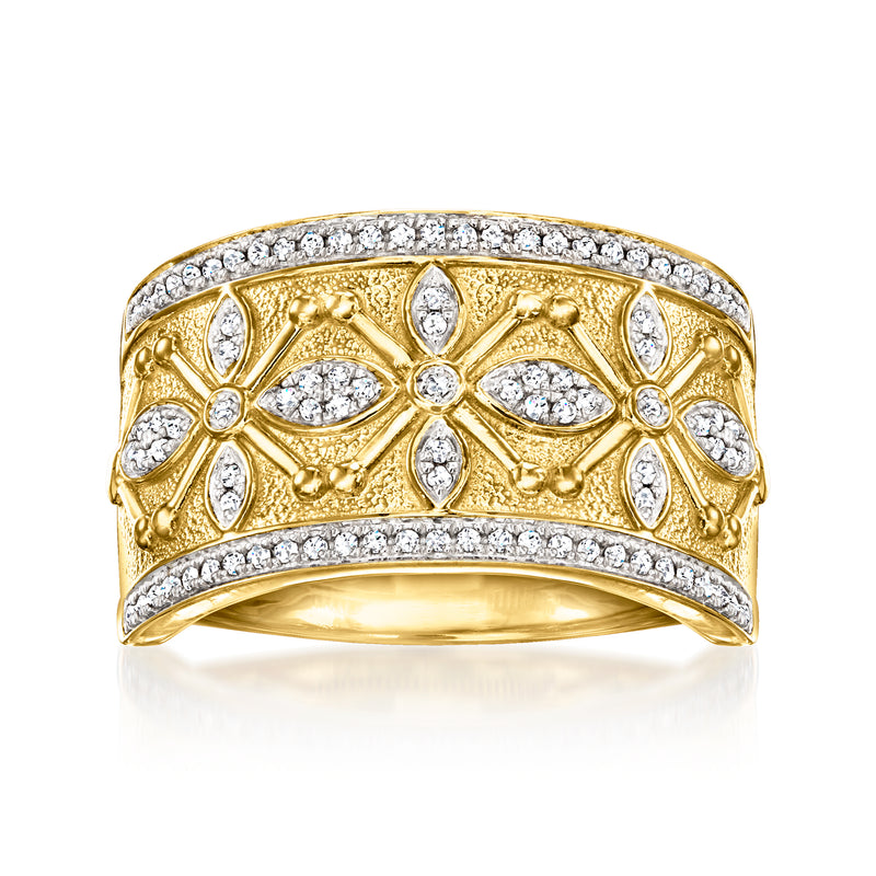 Etruscan-style gold diamond ring with ornate filigree and oval stone accents