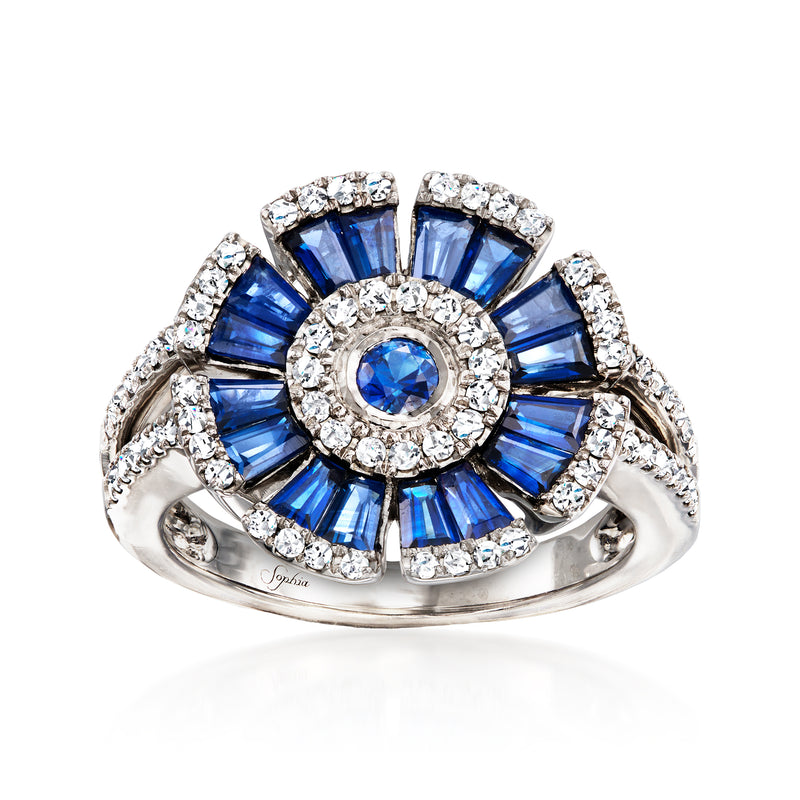 14kt white gold ring with blue sapphire center, diamond halo, and side diamonds