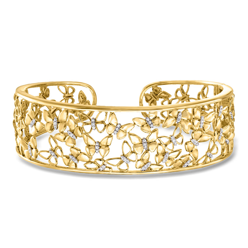 Gold cuff bracelet with diamond butterfly filigree and sparkling stones