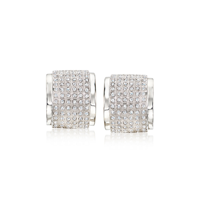 Pair of curved diamond earrings in 18kt white gold