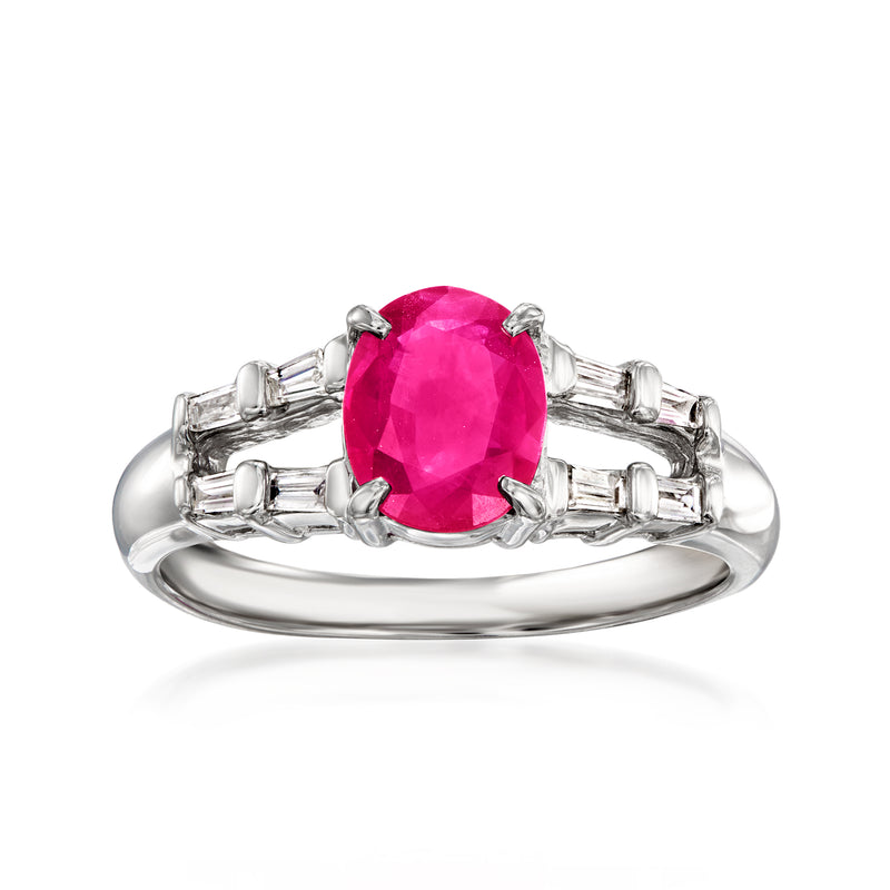 Platinum ring with oval ruby center and baguette diamond side accents
