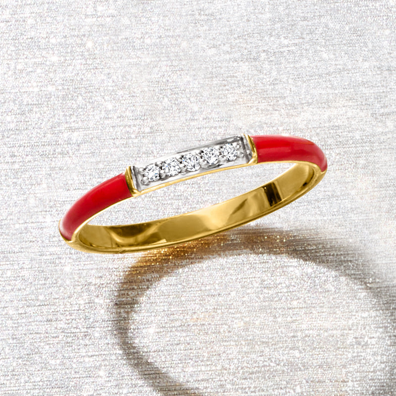 Red enamel ring with raised gold bezel and diamond accents