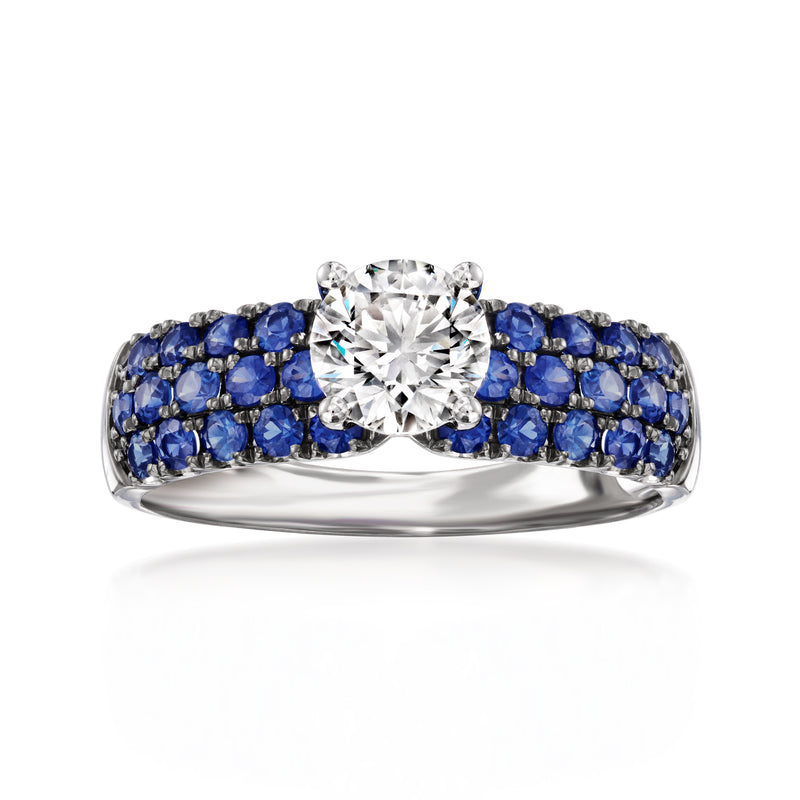 14kt white gold ring with round lab-grown diamond center and blue sapphire band