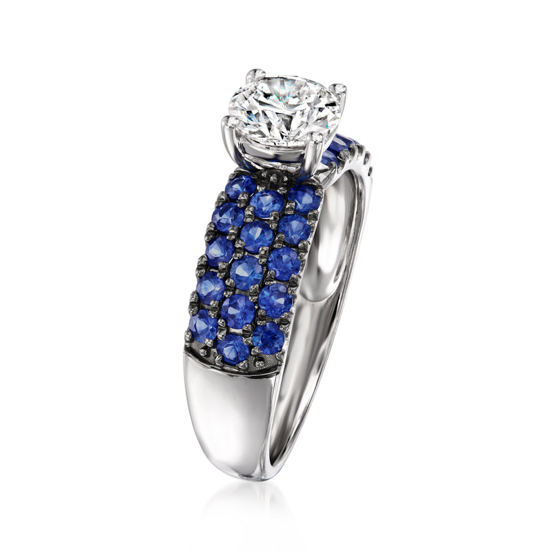 14kt white gold ring with round diamond halo and blue sapphire clustered rows