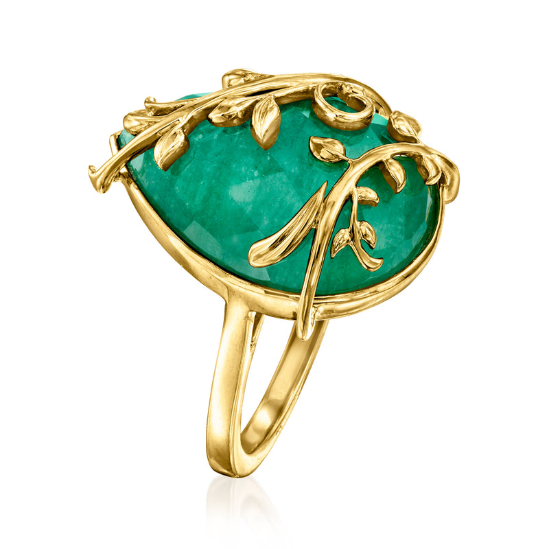 Oval green gemstone vine ring in gold with swirling leaf and scroll settings