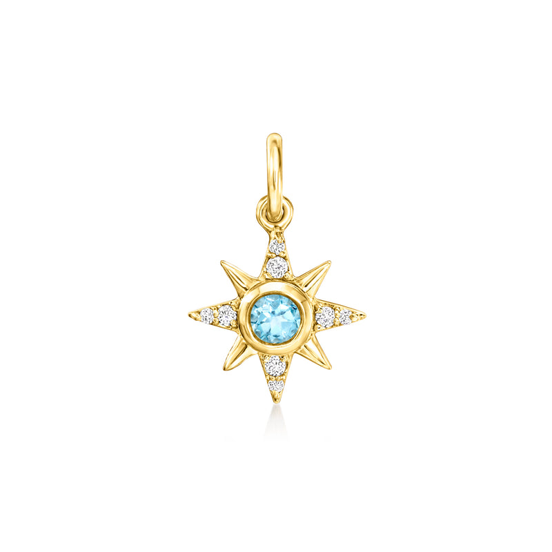 14kt yellow gold starburst charm with blue center and white crystal accents
