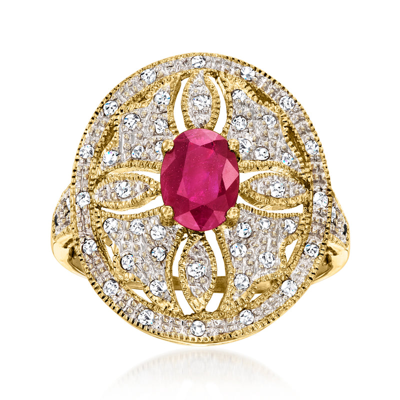 Vintage ruby and diamond halo ring, 14kt yellow gold with oval pink-red center stone