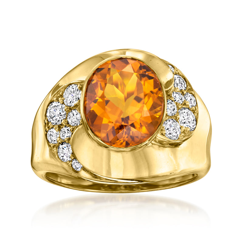 Vintage yellow gold ring with oval orange citrine and round diamond accents