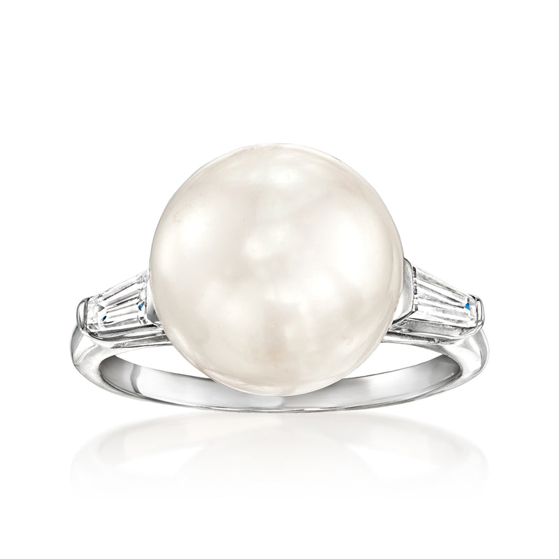 Platinum ring with a large white cultured pearl and small diamond accents on the band