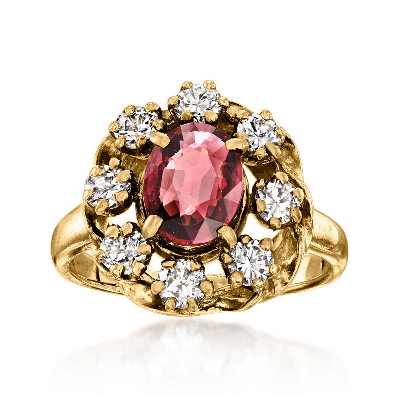 Vintage 10kt yellow gold ring with oval pink garnet center and round diamond halo