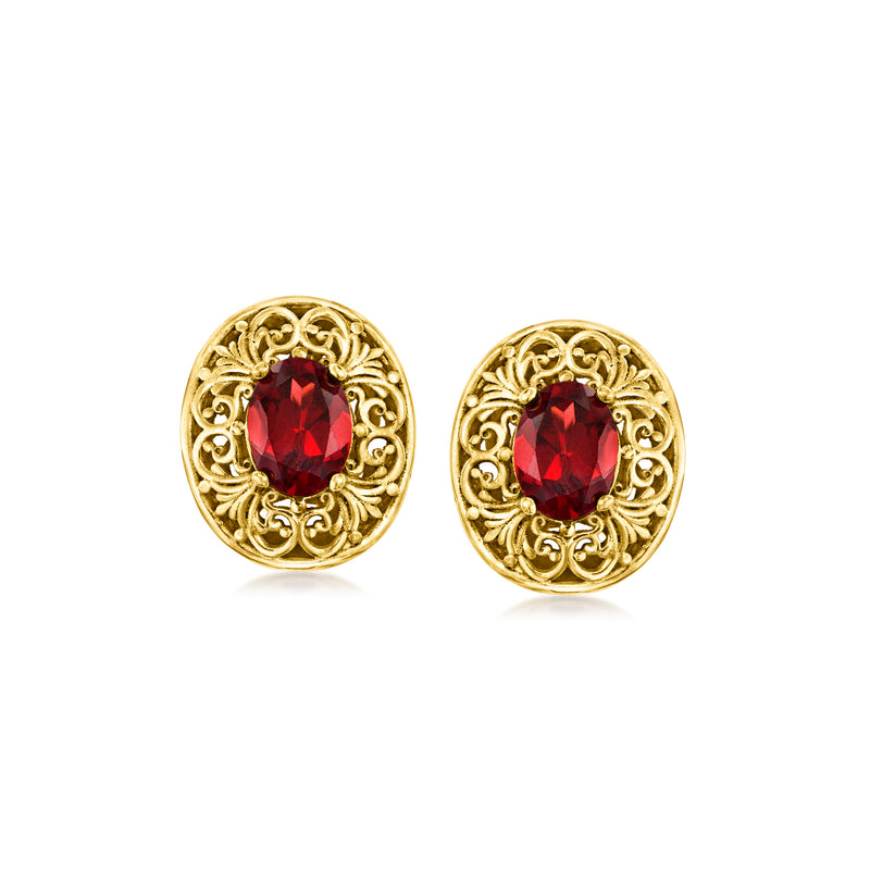 Gold-tone filigree stud earrings with red oval garnet, post backs