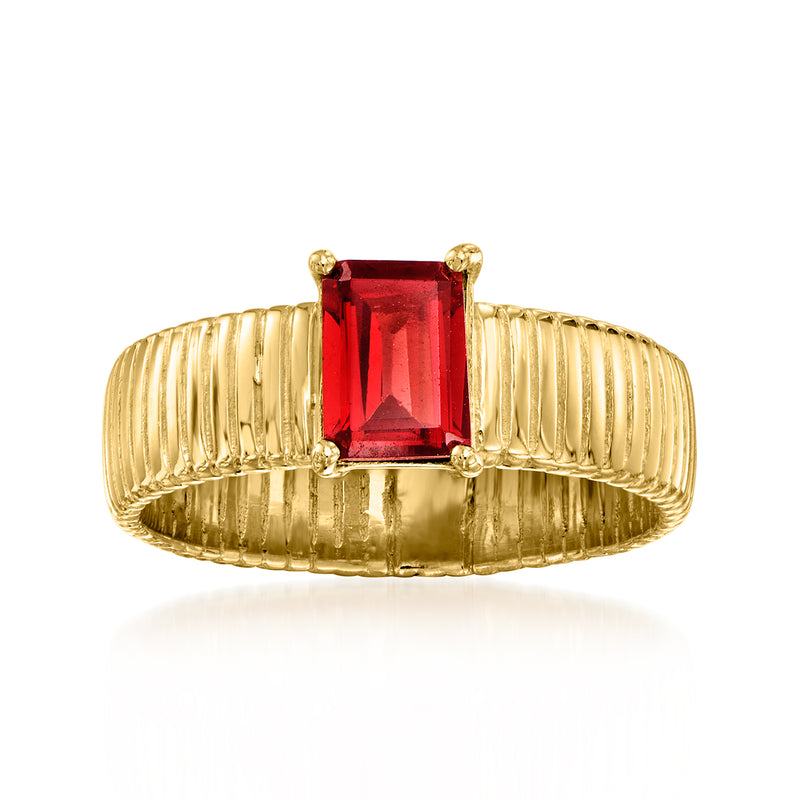 Ribbed gold ring with red rectangular garnet center and four prongs