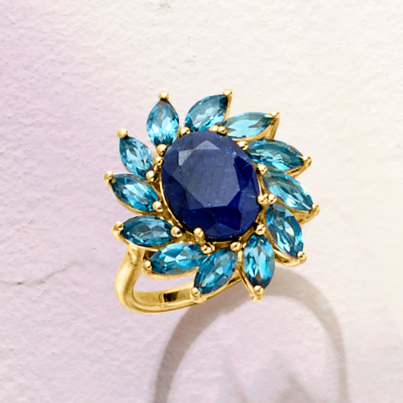 Sapphire center flower ring with blue topaz marquise petals, gold over sterling
