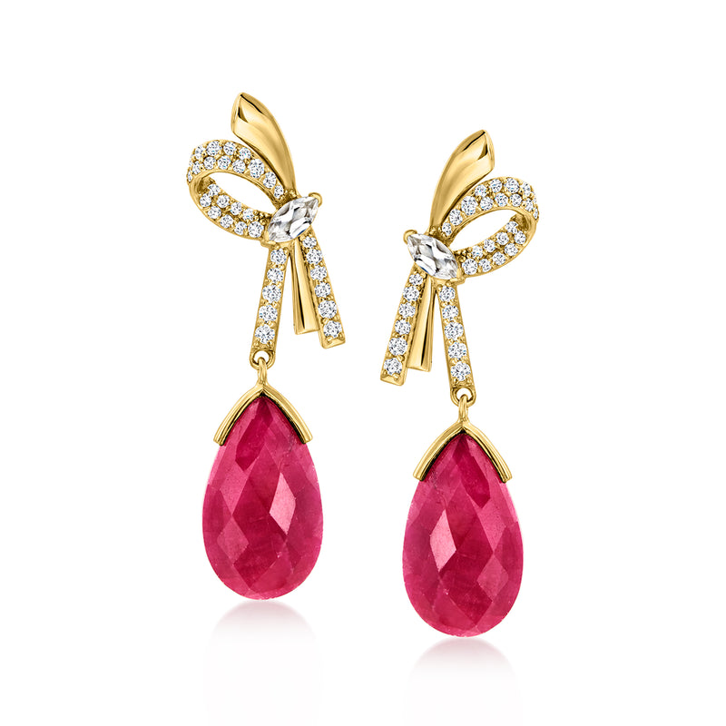 Gold bow drop earrings with sparkling white stones and ruby red teardrop dangles